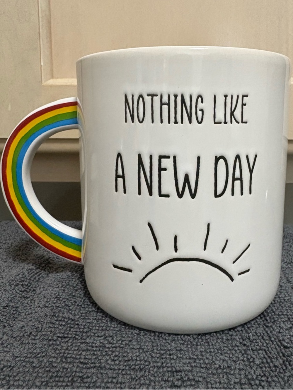 White Ceramic 'Nothing Like A New Day' Mug with Rainbow Handle